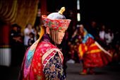 A Quiet Moment - The facial expression of this monk dressed up in a festival costume is potrays a moment of inner silence in contrast with the whirlwind of sound and movement around him.: by brooklana, Views[641]
