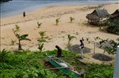 Fishermen prepare their net and their small boat before fishing. Fishing is the primary source of income in the island.: by brttrab, Views[3352]