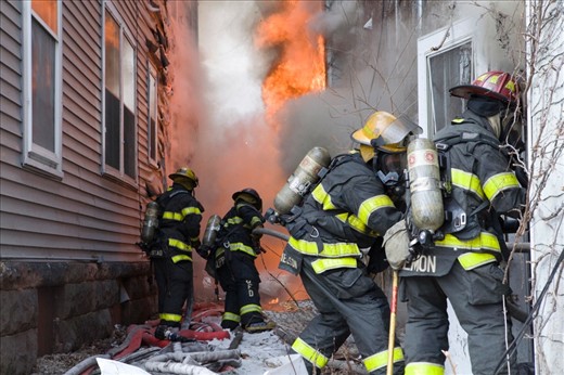 As the flames grow, firefighters work hard to tame, and put the blaze to rest.