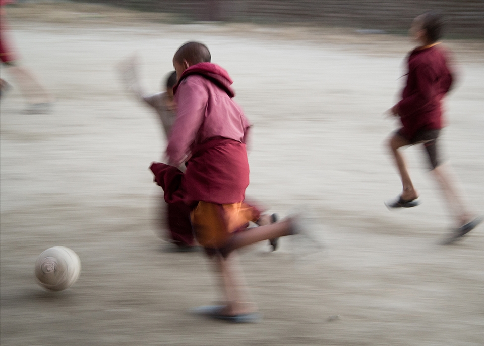 The biggest joy for the monks is football - even with a flat ball and 40 people.