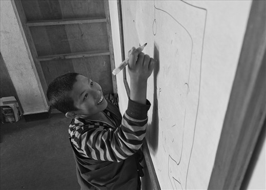 Hangman is an easy way to teach them spelling in English.