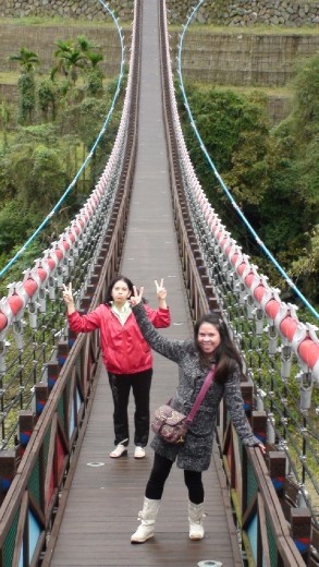 A new suspension bridge over the river beside the restaurant somewhere in the Ali Shan region