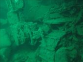 In the second hold back from the bow of the Kogyo Maru is a small bulldozer, a large cement mixer and hundreds of bags of cement: by bundynbeaches, Views[1198]