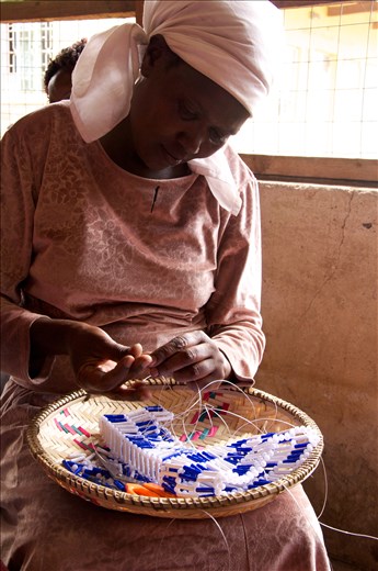 Weaving baskets is one of the group's income generating ideas to pay for their medicine and alleviate their poverty