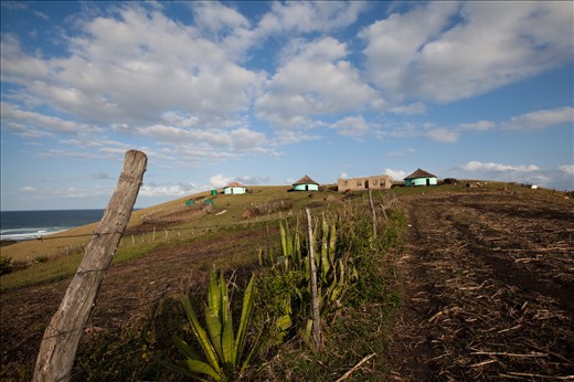 Homes, half built schools and land for labour