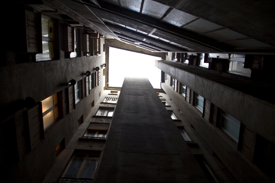 The first light in a typical apartment building in the 16th arrondissements of Paris. The light shines brightest in the darkest corners. Like a framed picture, the sky highlights the potential in every single day.