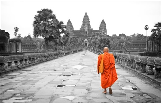 It was early in the morning after sun rise when I saw this monk walking towards the Angkor Wat. He was alone by himself, and it was a perfect moment!