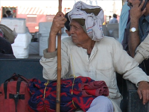 Old man desperately waiting for the train...