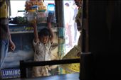 poor little boy hanging the counter of shop: by cameye, Views[412]