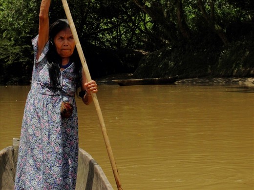 Doña Corina crossing the river Sarayacu (or river of corn) to visit her chacra (vegetable patch) located at a 30 minutes walk on the other side of the river. 
