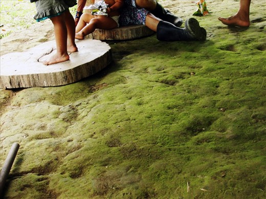 After a day of work, Doña Corina spends the afternoon with her grandchildren. 