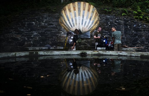 The Scallop Shell symbolizing the one who is on a move.  