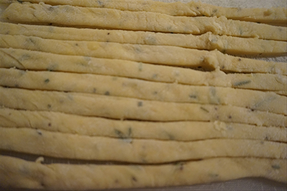 Strands of fresh herbed fettuccine. 