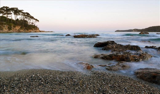 Misty breakers roll in on the coast of Australia
