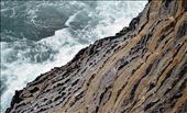 The Pacific Ocean crashes against a rigid cliff face of the Australia coastline.: by cape003, Views[716]