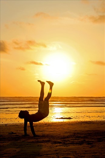 Jumping during the sunset in Canoa beach