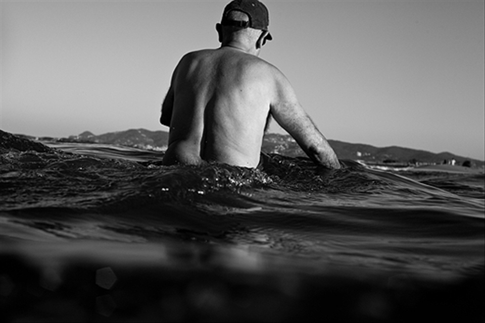 An old man in the Sant Pere beach