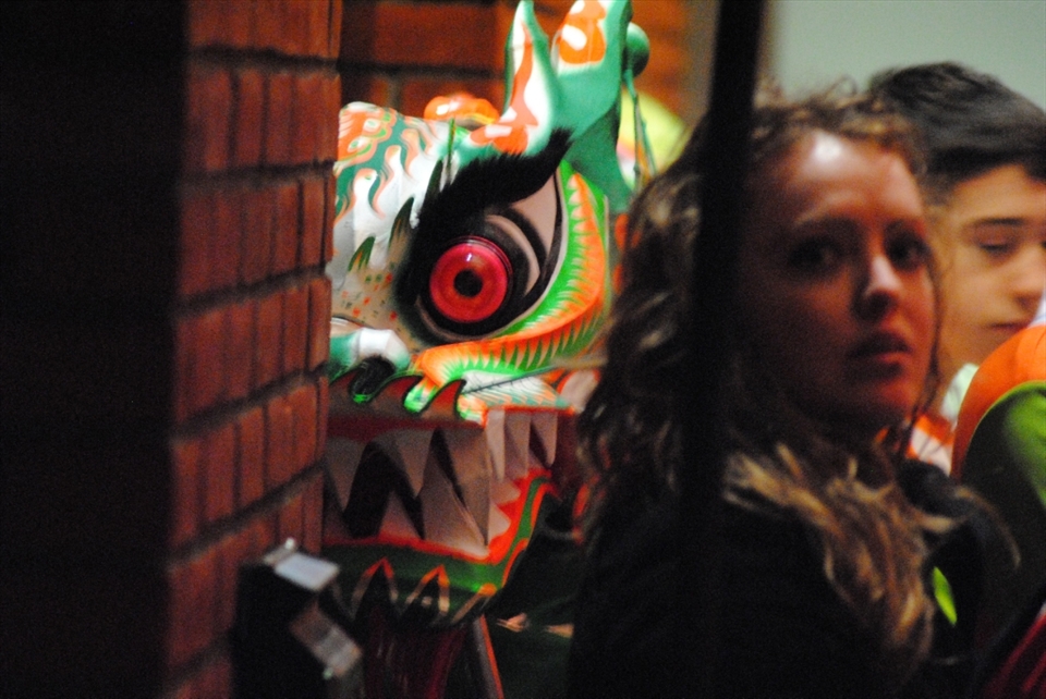 Chinease new year being celebrated.
the dragon been hidden from the public before its reveal.