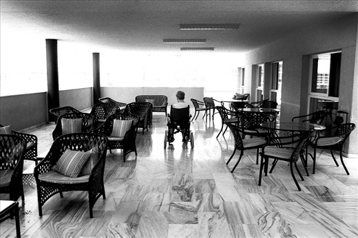 Picture of my mother, also ill from Huntington disease, at the porch of La Morenica. The composition reflects the feeling of loneliness that pacients suffer from.