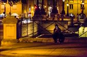 A man texts his girlfriend while smoking on Pont Neuf.: by carlospaillacar, Views[575]