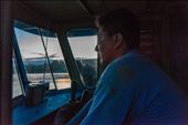 The Captain of El Junior boat steers the boat as it goes up the Ucayali river : by carlospaillacar, Views[402]