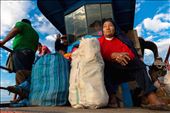 A group of passengers of El Junior sitting by the bridge as the boat fills up: by carlospaillacar, Views[331]