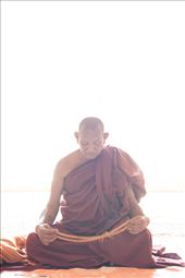 Within the Sulanami temple in Bagan meditation takes place. A Buddhist monk meditates while people go by without distracting his mind. Almost 90% of the country practices the Buddhist Therevada tradition. Monks are active non-violent protestors against the military regime in Burma and respected elements of society that are still venerated. : by carlospo, Views[1557]