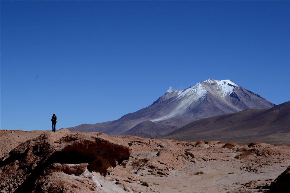 Watching the active volcanoes on our second day, from the outer-space-like rocks