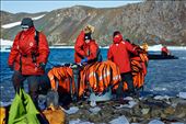 Cohabitation is basic to human survival in Antarctica. Scientists from different countries studying the frozen continent must join forces to carry out their researches. In the picture, Russian scientists newcomers to King George Island collaborate with Chilean colleagues to download the necessary material for their job from a nearby vessel.: by carluscp, Views[908]