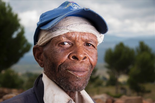 Portrait of the old Herd Boy, while he takes a break from watching his cattle grazing.