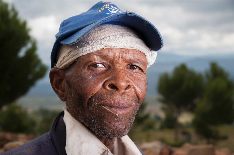 Portrait of the old Herd Boy, while he takes a break from watching his cattle grazing.
