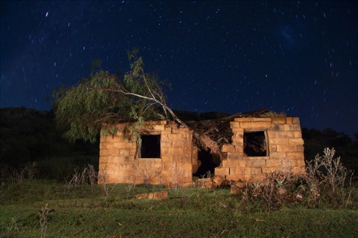 This is an old school building at the Masitise Mission Station. It has been abandoned for the last ten years and a Tree climbed on its interior, creating the perfect scene for a long exposure star trail photograph. 