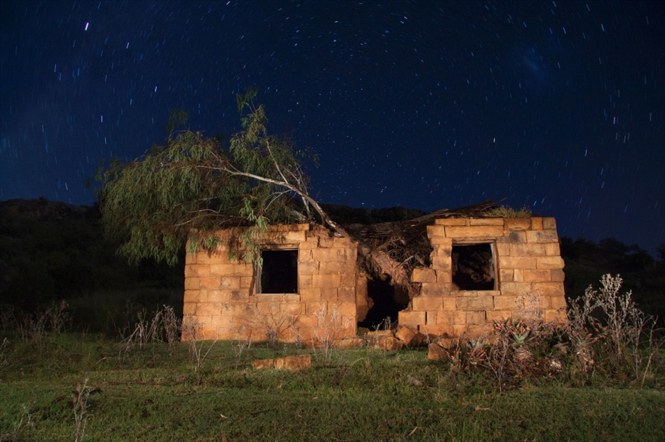 This is an old school building at the Masitise Mission Station. It has been abandoned for the last ten years and a Tree climbed on its interior, creating the perfect scene for a long exposure star trail photograph. 