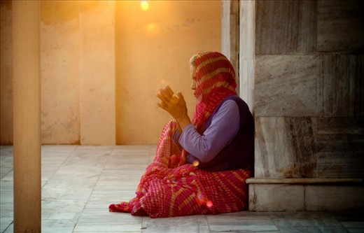 PRAYER TIME.
People come to the temple at the hour of prayer