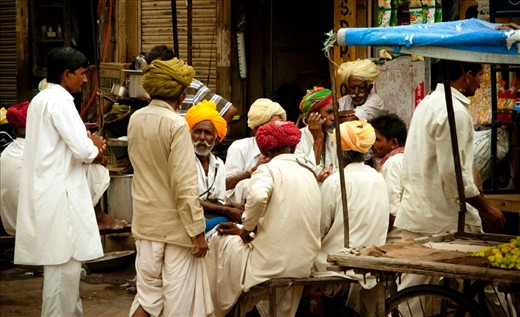 SOMETINHG WE DEFINE. People gather to talk divided by caste

