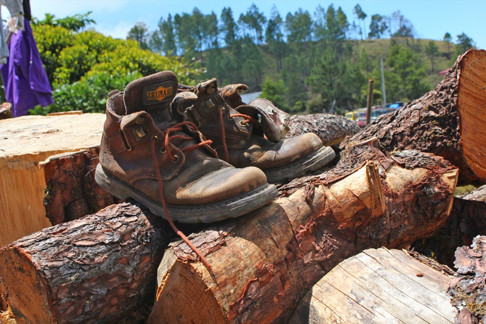 an old pair of boots weary of travel gives us a glimpse of what to expect ahead.