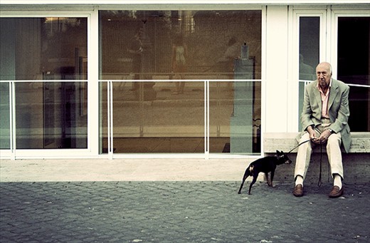 An old man with his dog