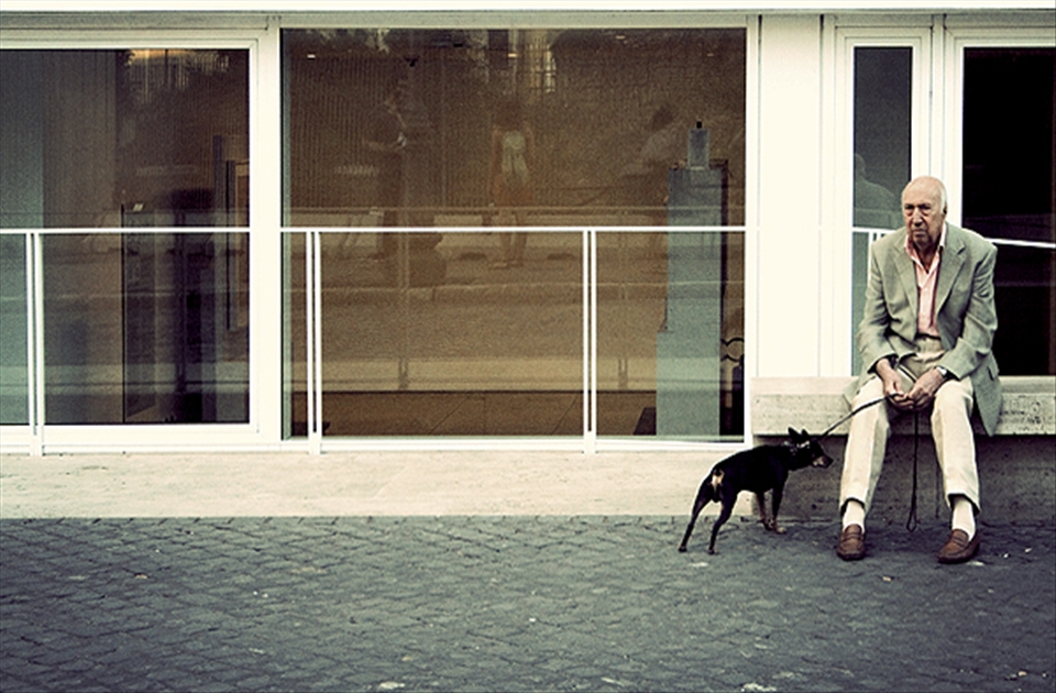 An old man with his dog