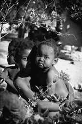 Behind the guest house where we stay at the orphanage is a long pathway that leads to a place called the prayer gardens. On this walk you pass large groups of people praying in circles or on their knees. There is one lonely house that you pass where all the children outside are nude and hungry. Members from our group brought these children clothes and power bars the next day.: by casedeea620, Views[520]