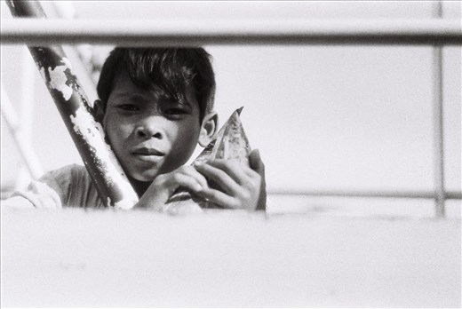 Selling food for money for food on the Neak Loeung ferry