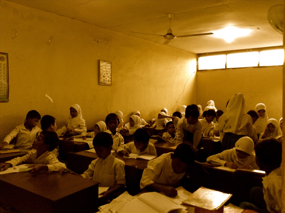 This is an ordinary day in Dito's class in SD Mi Al Istiqomah. As a school located in slum area, some foster parents like me are investing our money in its kids.