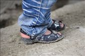 A young girl wears jeans and fancy shoes in a street in Kabul. Jeans were practically banned by the Taliban regime because of their Western origin while girls were not allowed outside the home. Now, just over a decade later, a girl is publicly wearing jeans in the street with sparkles on her shoes. : by cathjam, Views[2345]