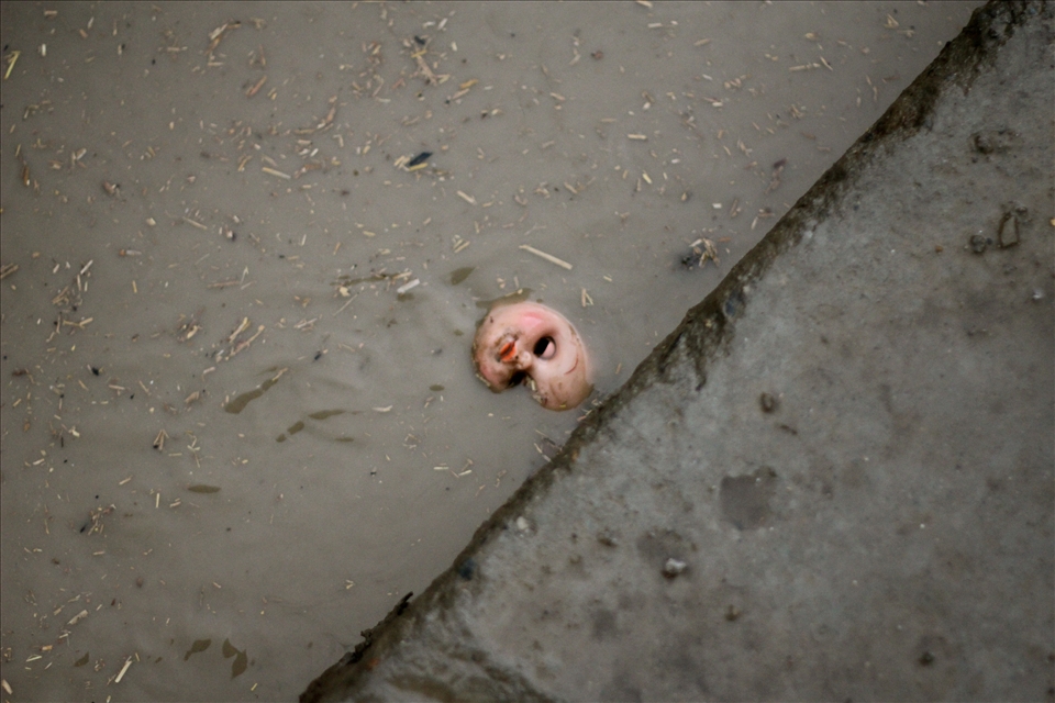 A doll lies abandoned in a gutter after heavy rain in Kabul. 

The drains running alongside either side of the roads in Kabul are usually uncovered and are often used to dispose of rubbish and sewerage. 