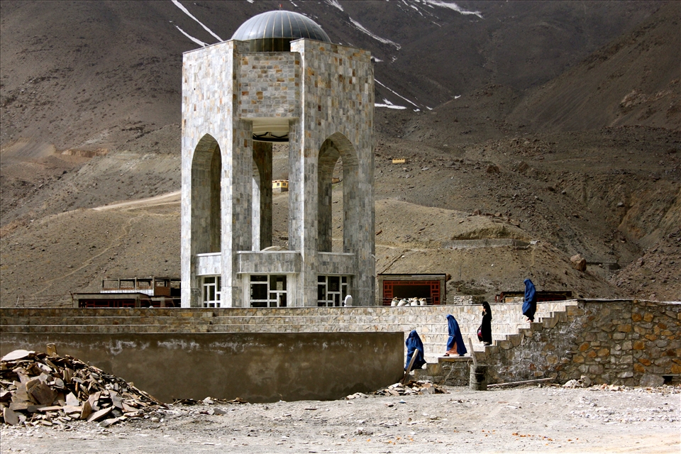 Women wearing the burqa leave the tomb-cum-shrine of Ahmad Shah Massoud in Panjshir, Afghanistan. 

Massoud is nicknamed the “Lion of Panjshir” for his role in resisting the occupation of Afghanistan by the Soviet regime from 1979 to 1989. He is also a figurehead for his opposition to the Islamic extremism of the Taliban regime. Al Qaeda suicide bombers assassinated him September 9, 2001. The date now a national holiday in Afghanistan.
The burqa is a piece of material covering a woman from head to foot, including her face. It was popularised during the Taliban regime in Afghanistan when it was illegal for a woman to be in public without wearing it.
