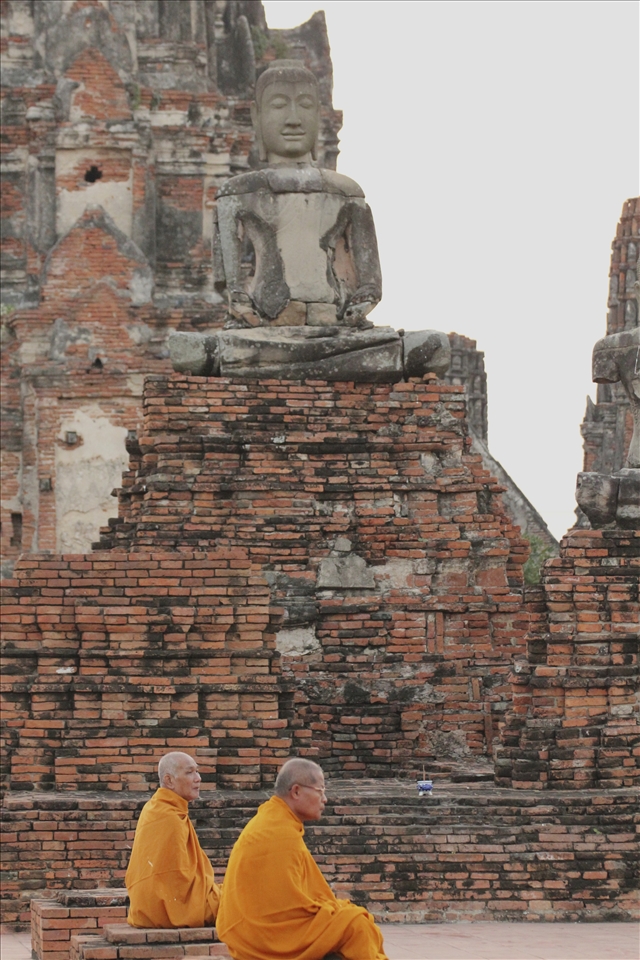 Two monks within the ruins of Ayutthaya, the ancient capital of Thailand