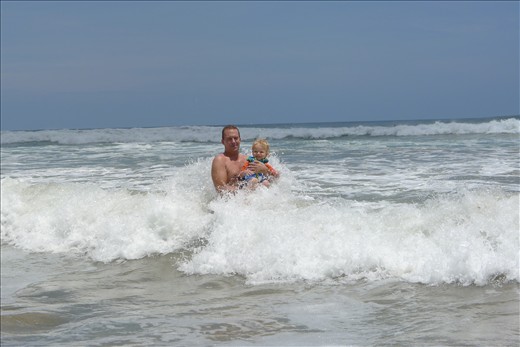 Jackson and Daddy playing in the waves