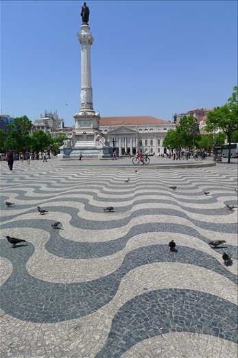 Wavey plaza tiles in Portugal - make be dizzy!