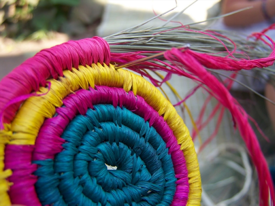 They are experts in the field of basket-weaving. In the most rural areas of Rwanda, you will often find that women congregate and practice their amazing skills with a needle. These talented women gather to talk about their families and at the same time create a piece of work that can later be sold or traded for different materials. Most often they sale baskets to tourists and people looking for a particularly colorful artifact from the very Rwandan soil and crops. 