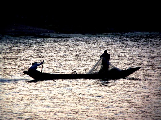 The early risers. When you sit on the edge of Lake Kivu and you wait for the sun to rise, quite often it is filled with chants and excitement. In the morning, before the sun even peeks over Rwanda's thousand hills, you see in the distance that there are numerous fishers out doing the day's work before people even come out to the fish markets. The air is filled with Kinyarwandan songs and the smell of fresh fish.