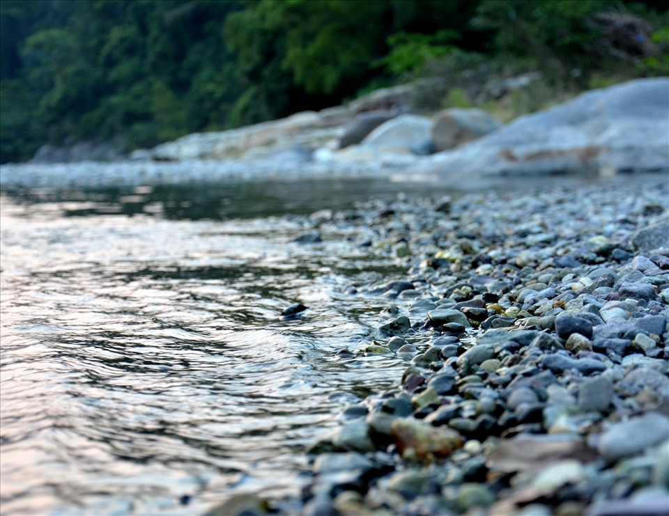 May 2013. A Light sparks with a meeting of two halves.Rio Cangrejal, Honduras